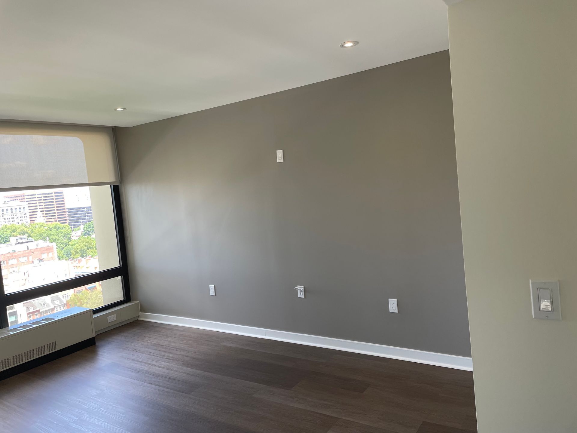 There is a large window in the middle of the room.