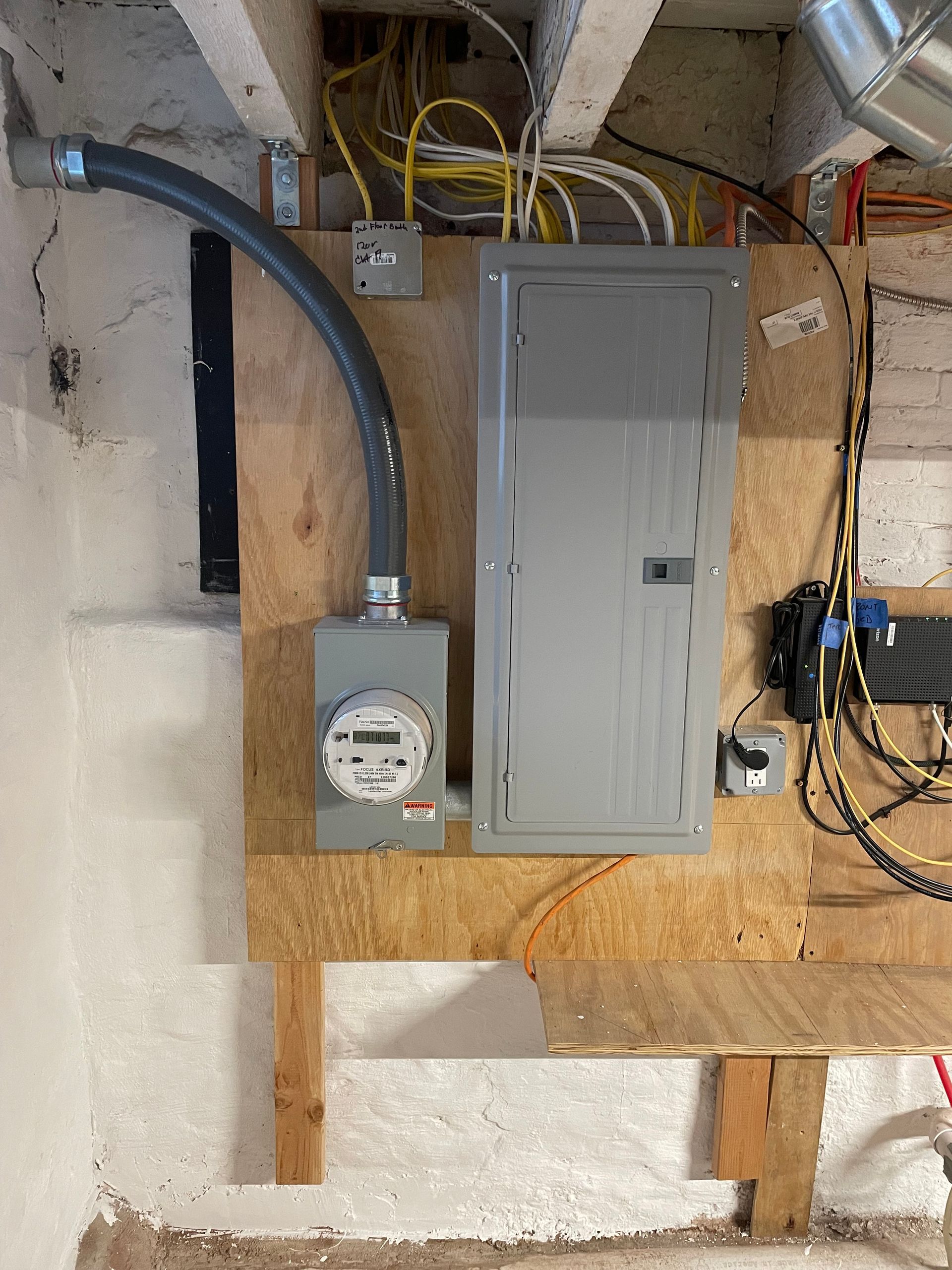 An electrical box with a meter attached to it