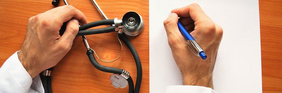 Doctor's hand and stethoscope