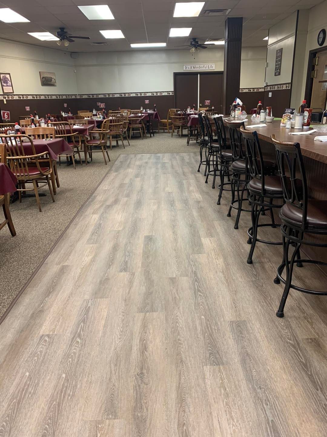 A large dining room filled with tables and chairs.