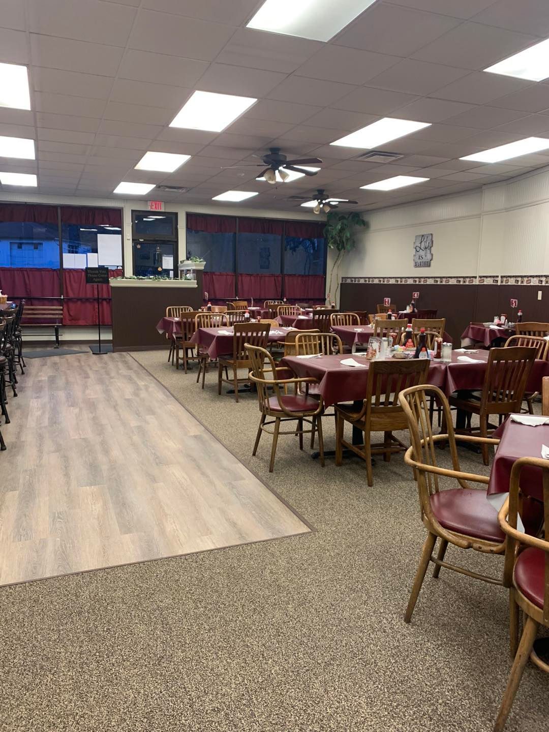 A large dining room filled with tables and chairs.