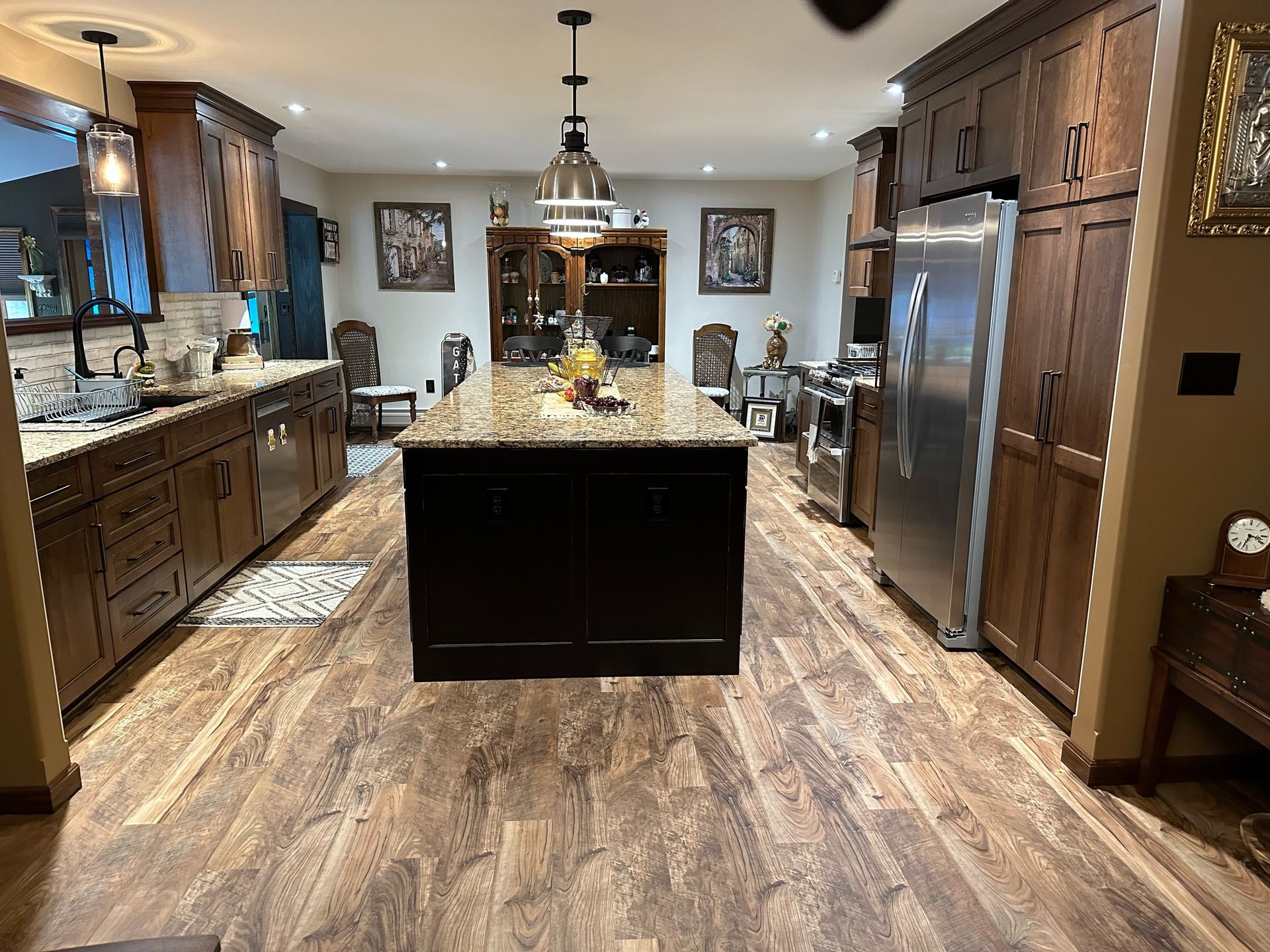 There is a large island in the middle of the kitchen.