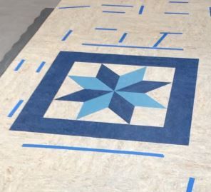 A blue and white square with a star in the middle