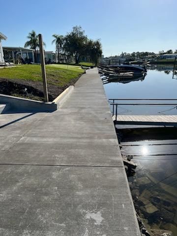 Greg & Tony Project seawall sidewalk after