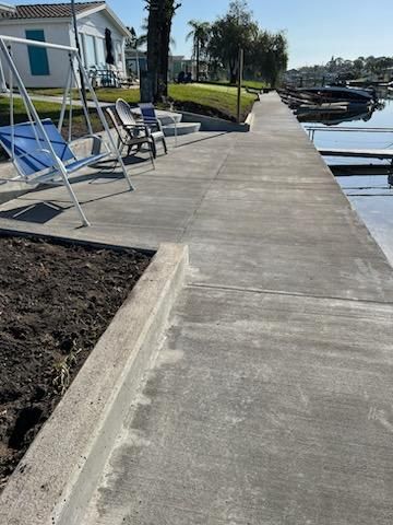 Greg & Tony Project seawall walkway after