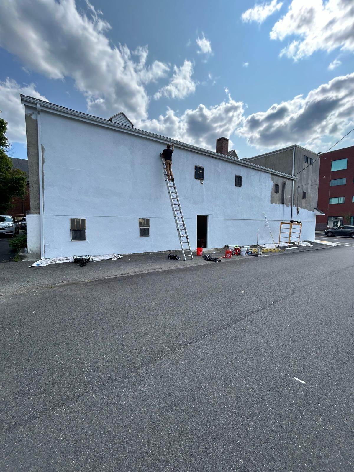 a white building being painted on