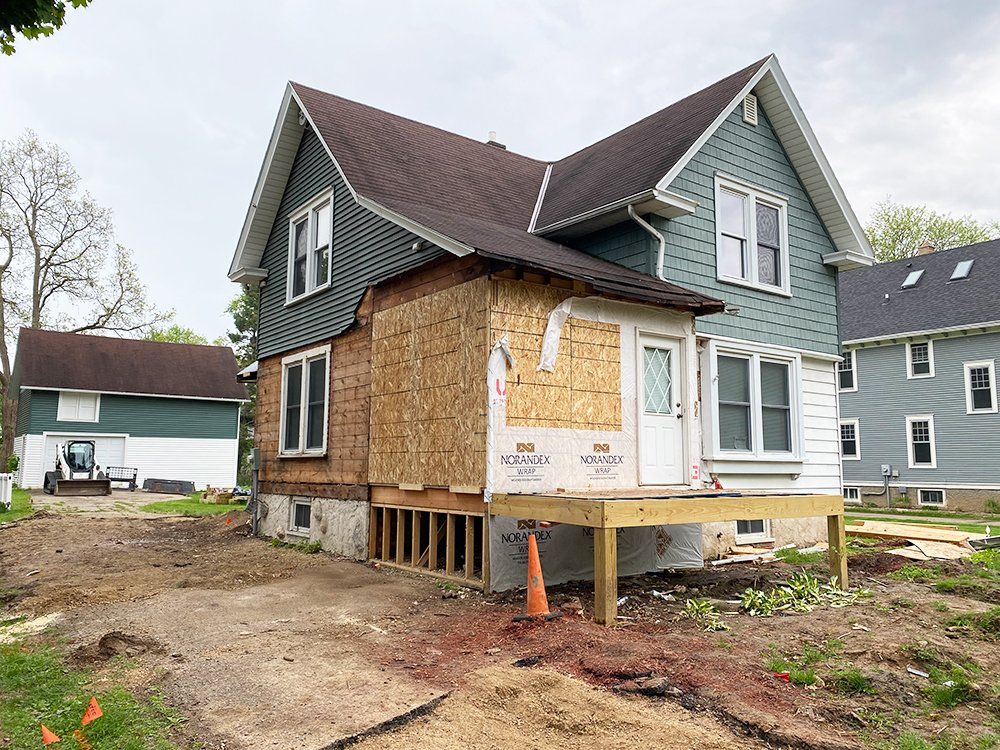 Siding installation on the side of a house