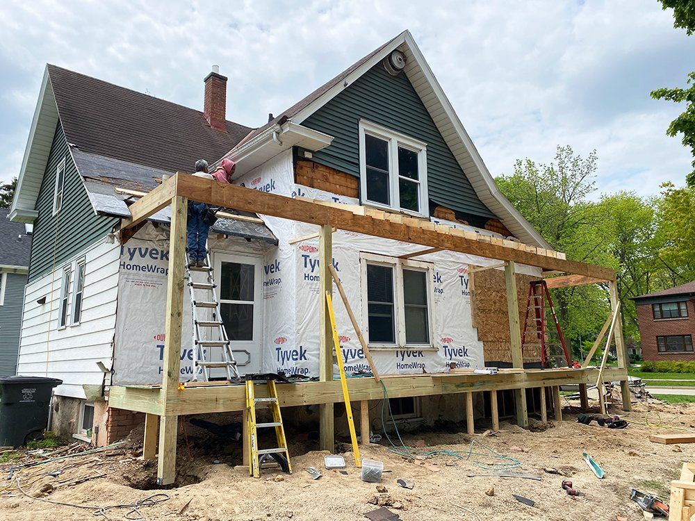 Siding installation on the front part of the house
