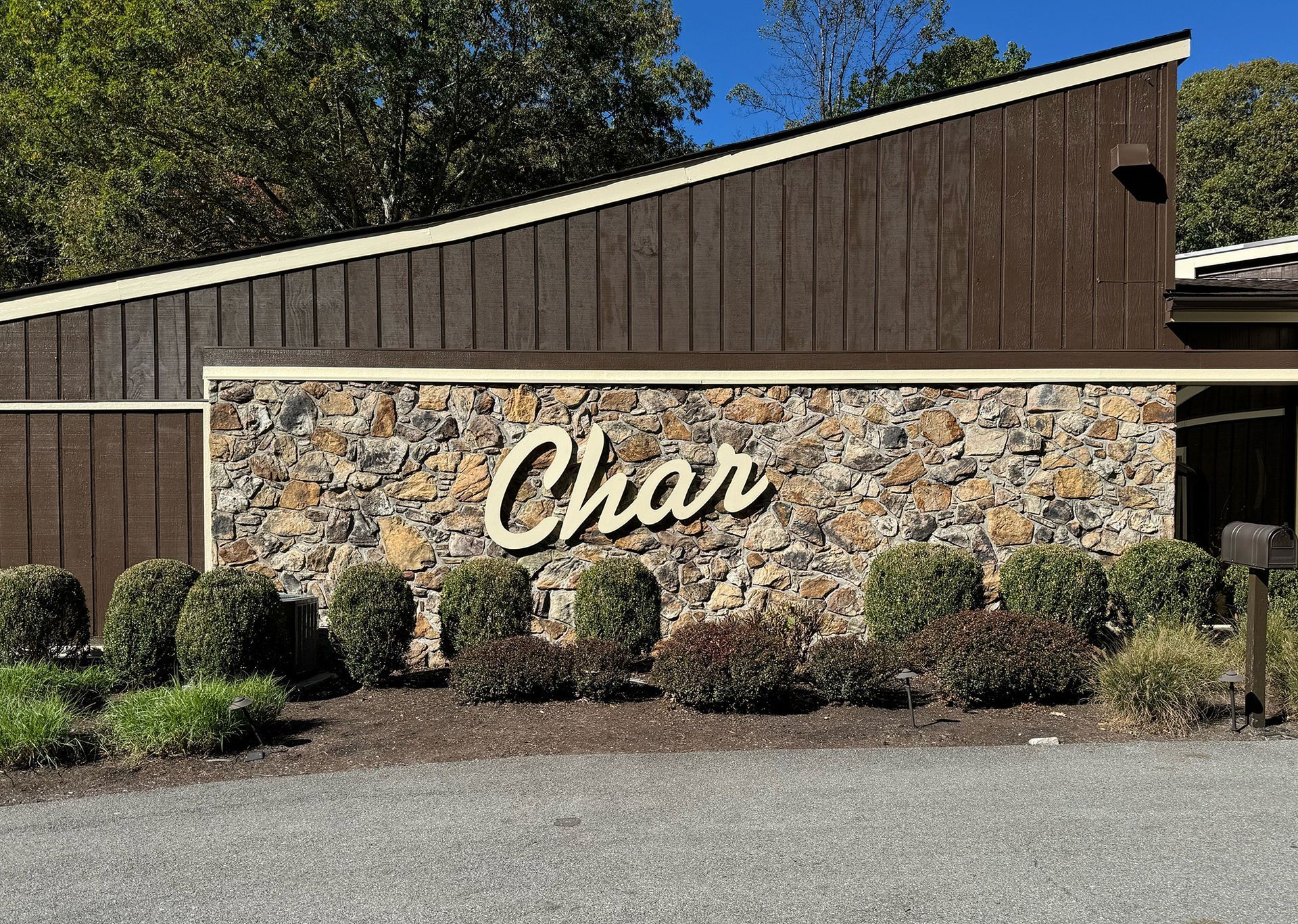 The word Char is on the side of a building.