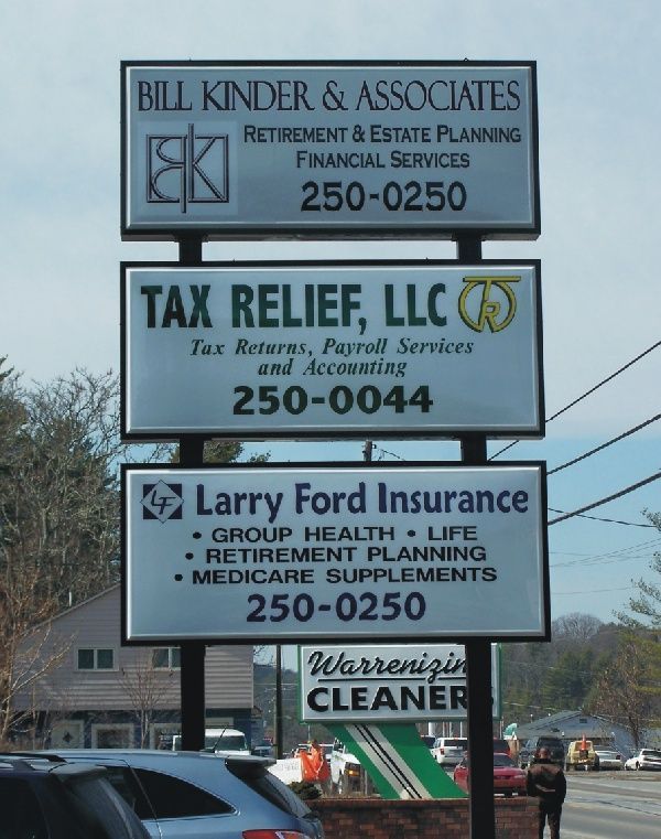 signages of three businesses
