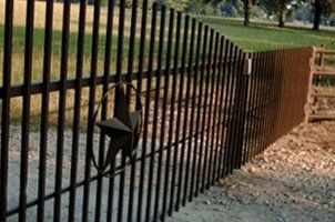 A wrought iron fence with a star on it.