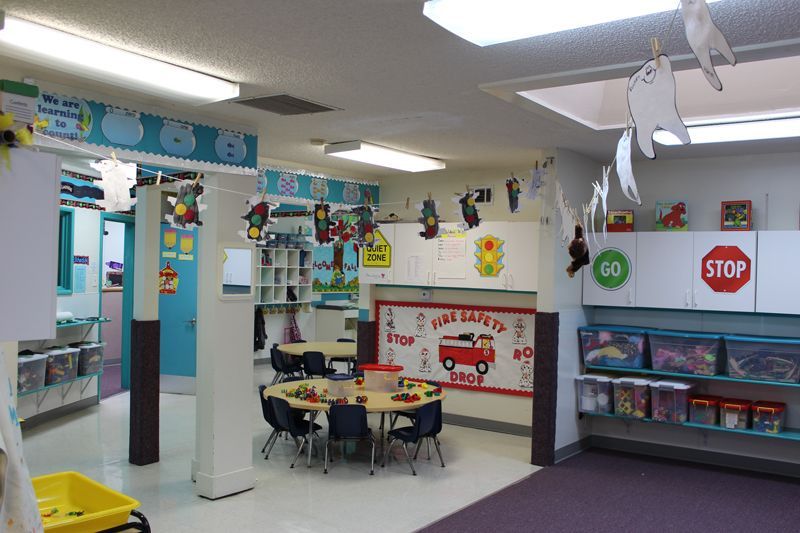 A classroom with a stop sign on the wall