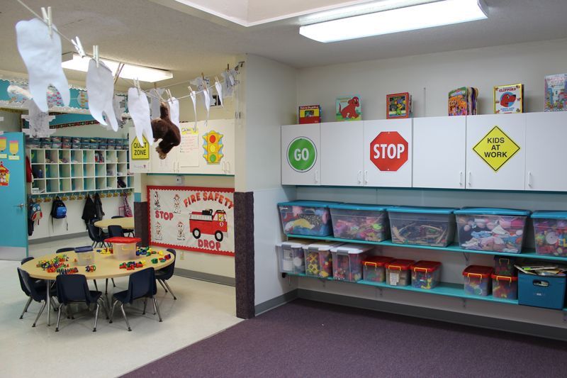 A classroom with a stop sign on the wall