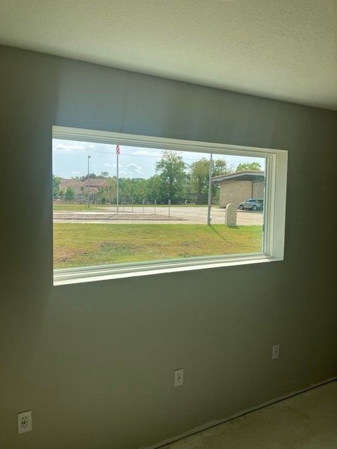 There is a large window in the middle of the room.