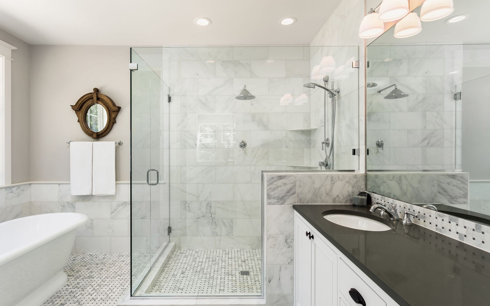 Frameless shower enclosure