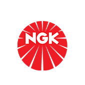 The red and white NGK brand logo featuring bold letters inside a circle with white rays radiating outward.