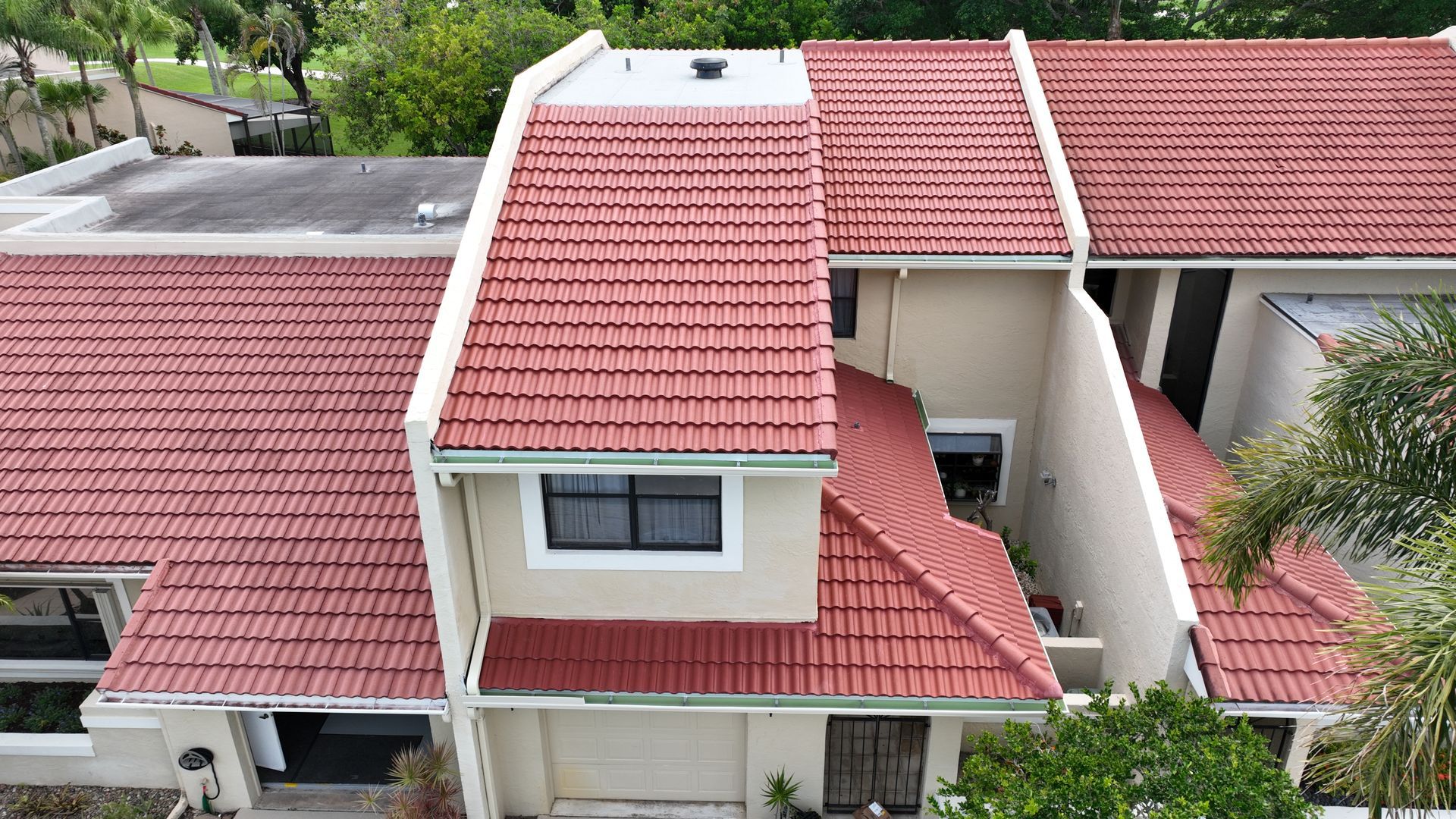 A newly installed Spanish Red New Point Estate S tile roof in Palm Beach Gardens
