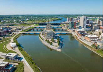 An aerial view of a city with a river running through it.