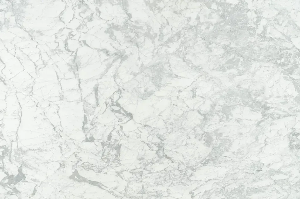 Light gray and white marble texture background with subtle veining