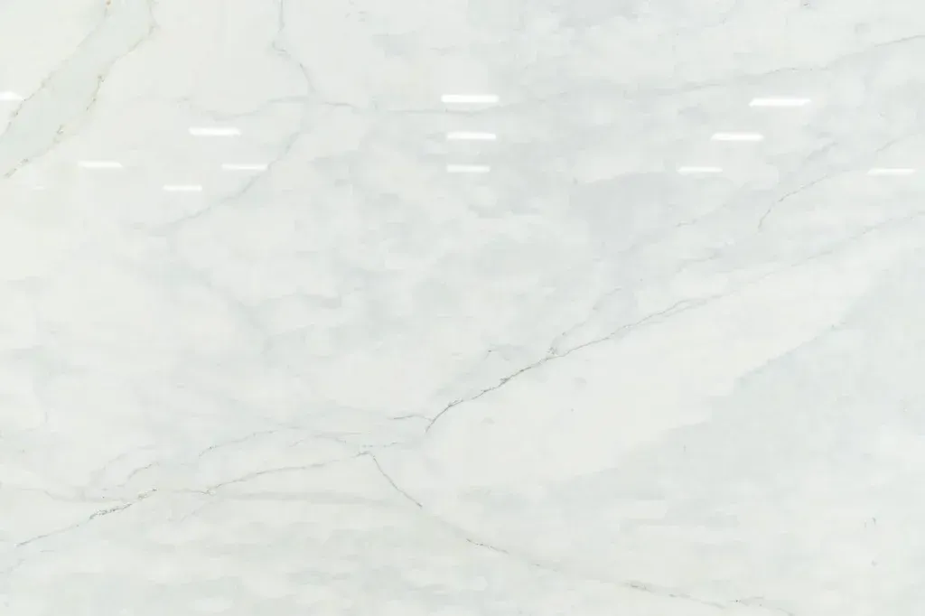 Light gray marble surface with subtle white and blue veining