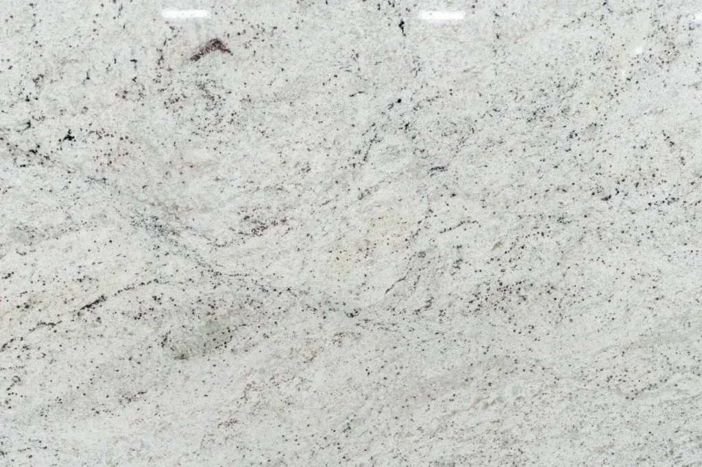 Light gray speckled stone or concrete surface texture