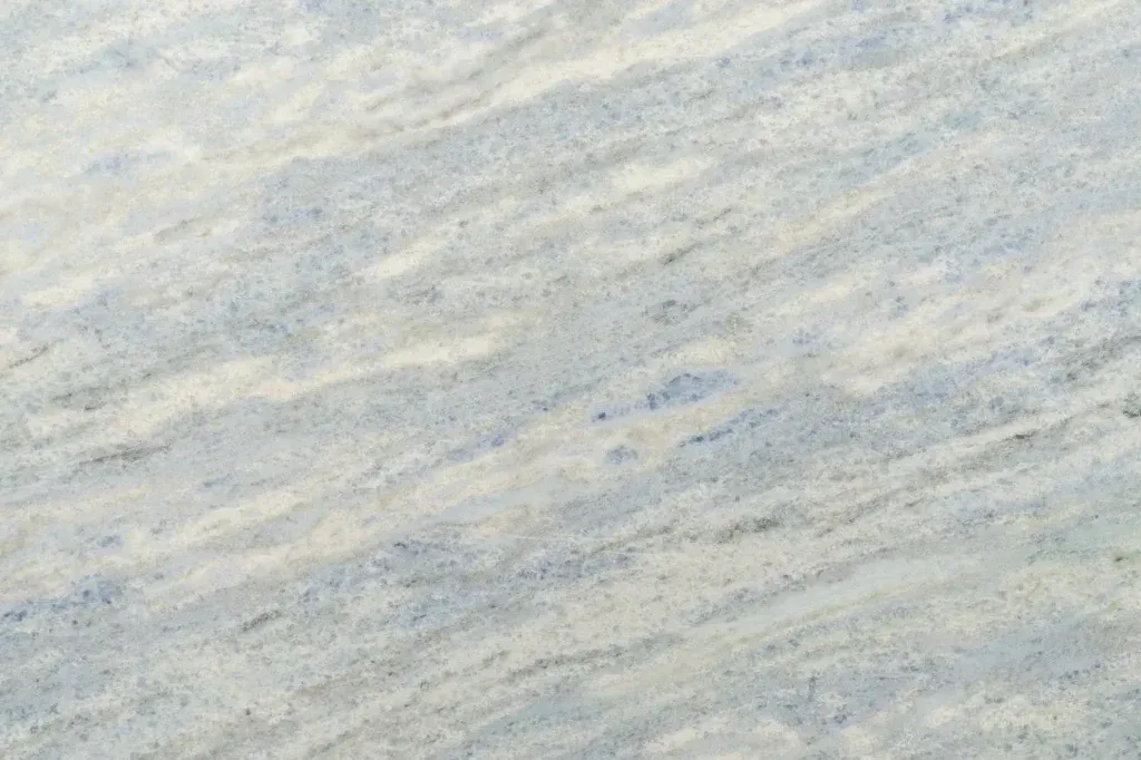 Light gray and beige marbled texture with subtle blue streaks