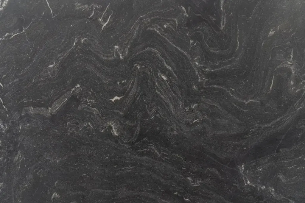 Dark gray marbled stone texture with subtle swirling patterns