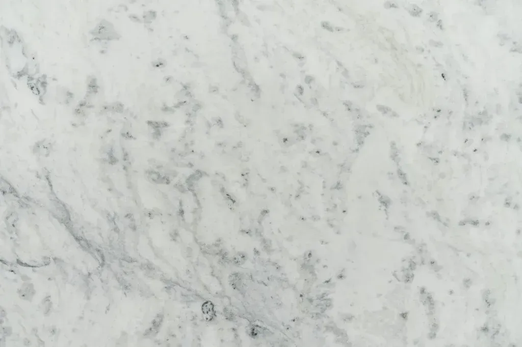 Light gray marble surface with subtle white and dark veining