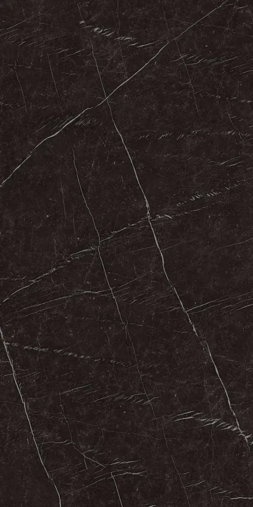 Dark textured surface with faint diagonal scratches and a white seam line