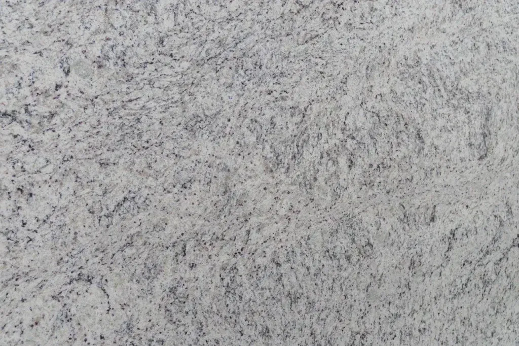 Light gray speckled stone or concrete surface texture