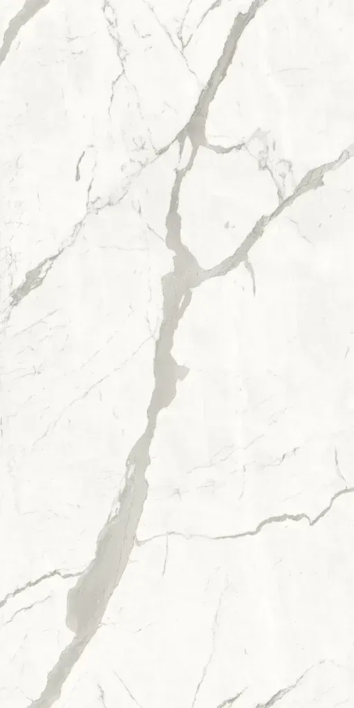 White marble surface with subtle gray veining and cracks