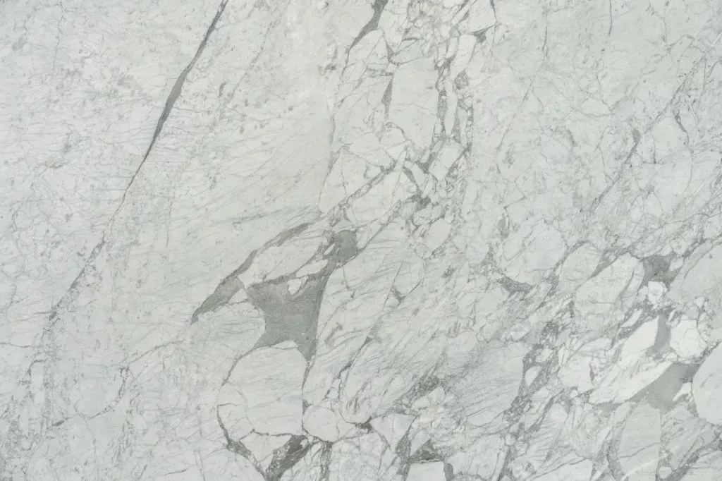 Light gray marble surface with subtle white and dark veining