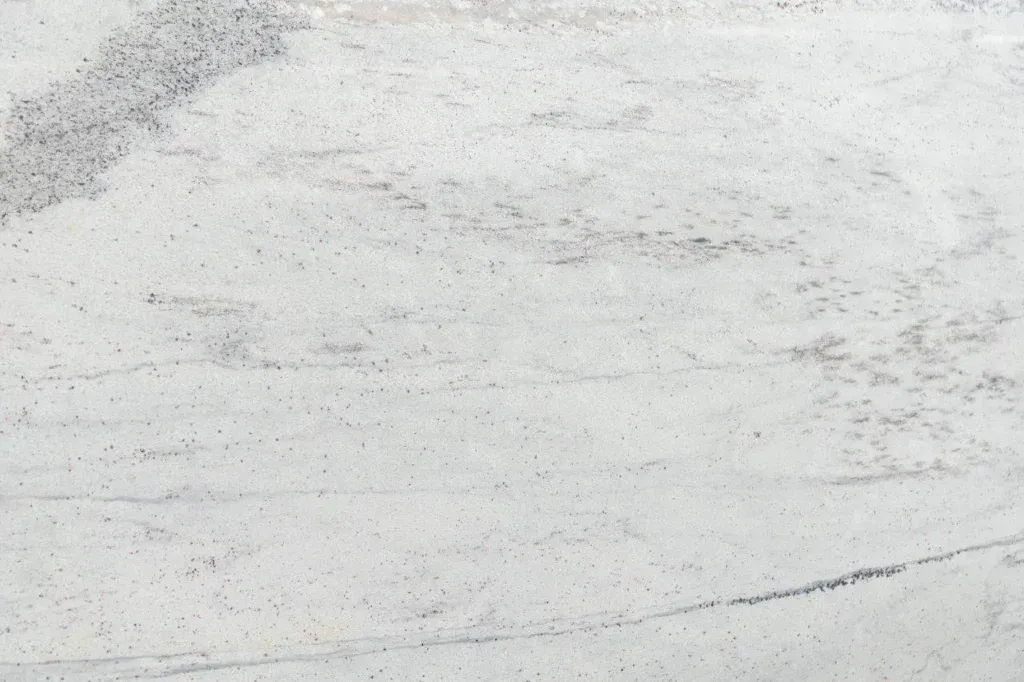 Light gray, textured surface with faint speckling and subtle diagonal lines