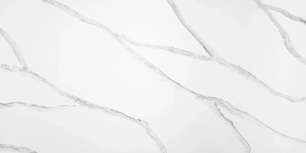 White marble-like surface with soft gray veining pattern