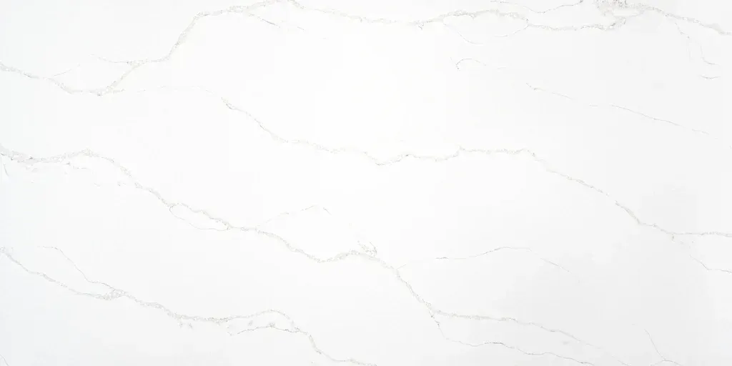 White marble surface with subtle gray veining.