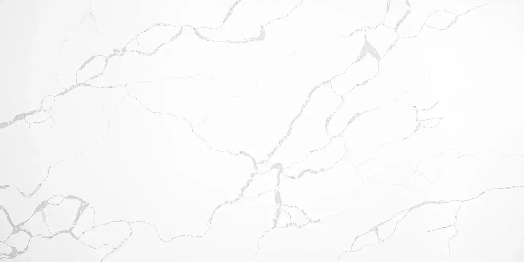 White marble or stone surface with subtle gray veining.