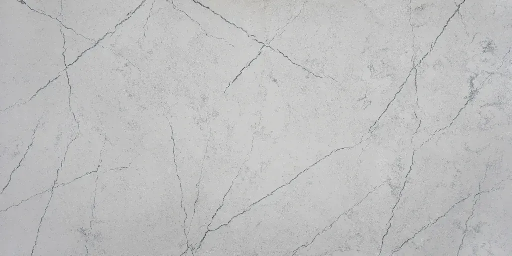 Light gray marble surface with faint white and dark veining