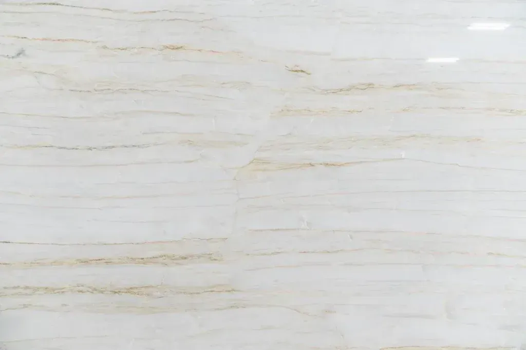 White marble surface with subtle beige and gray veining