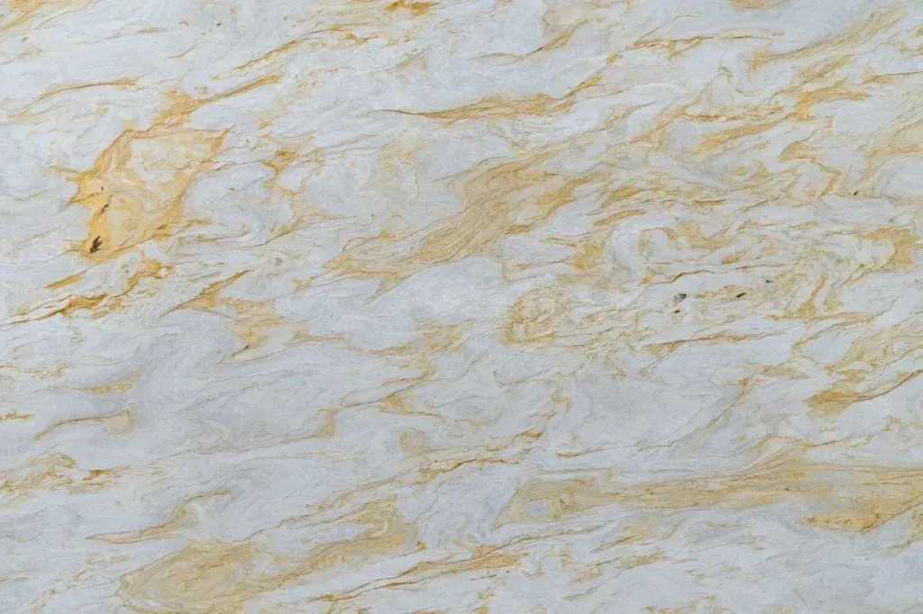 White marble-like surface with subtle gray veining and warm beige streaks