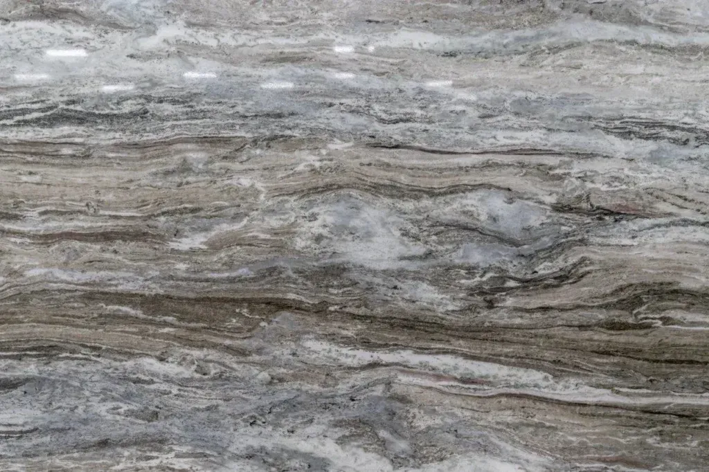 Gray and brown stone with layered wavy bands and marbled texture