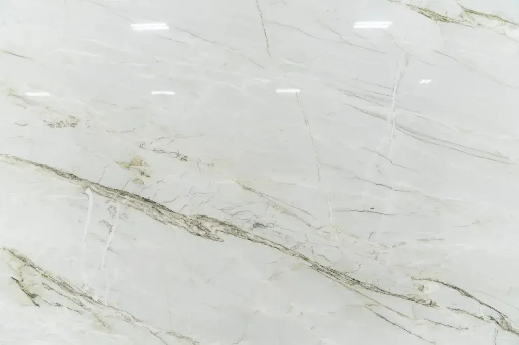 Light gray marble surface with subtle white and gold veining