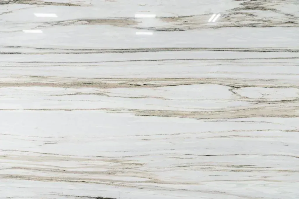 White wood planks with subtle beige and gray streaks, forming a rustic textured background