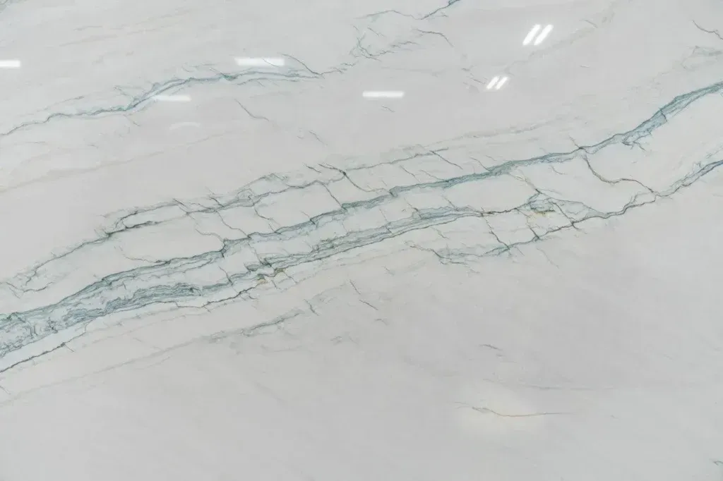 White marble surface with subtle gray and blue veining