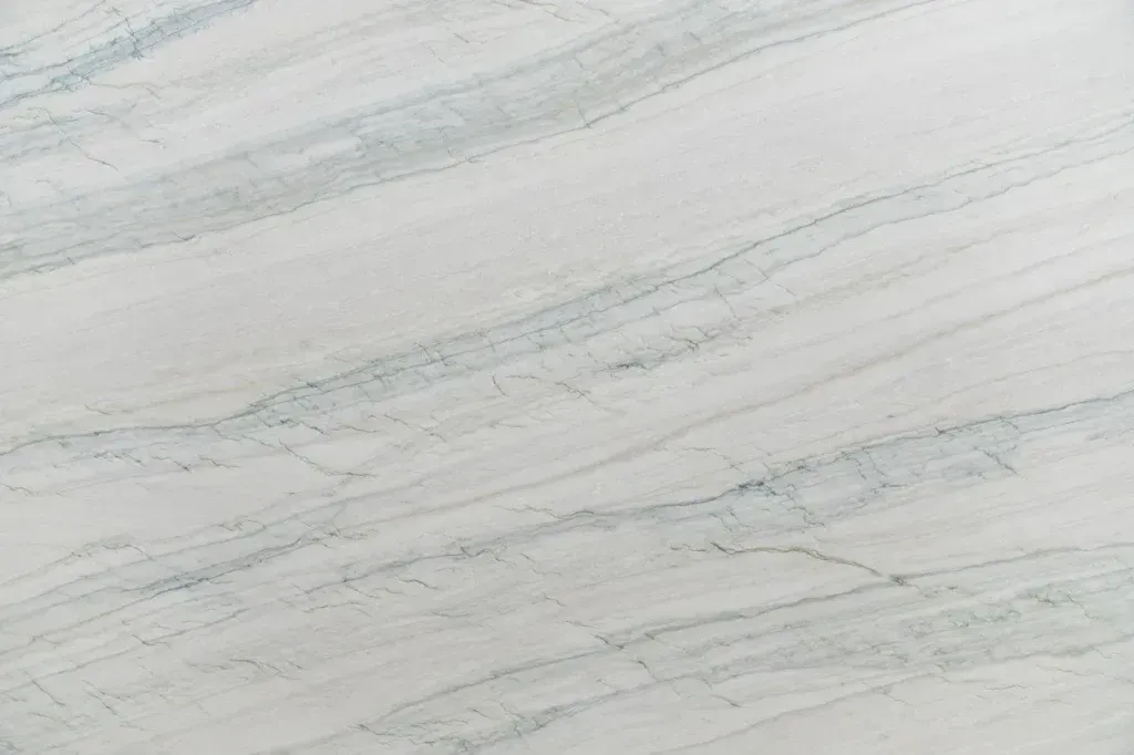 Light gray marble surface with subtle white and blue veining
