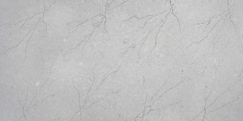 Light gray marble surface with faint veining and subtle texture