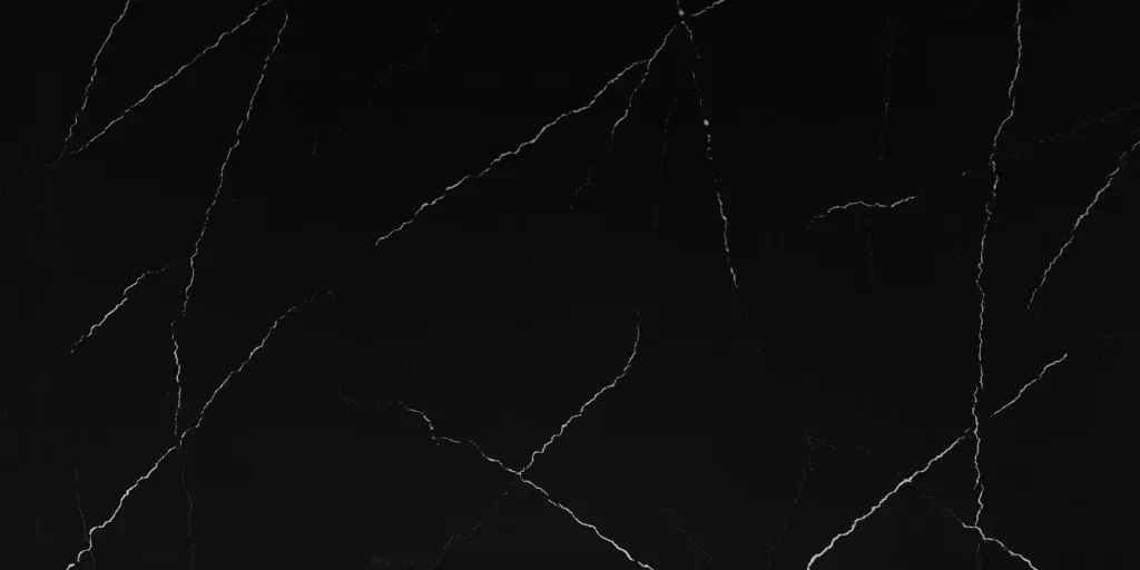 Dark cracked surface with thin white fracture lines