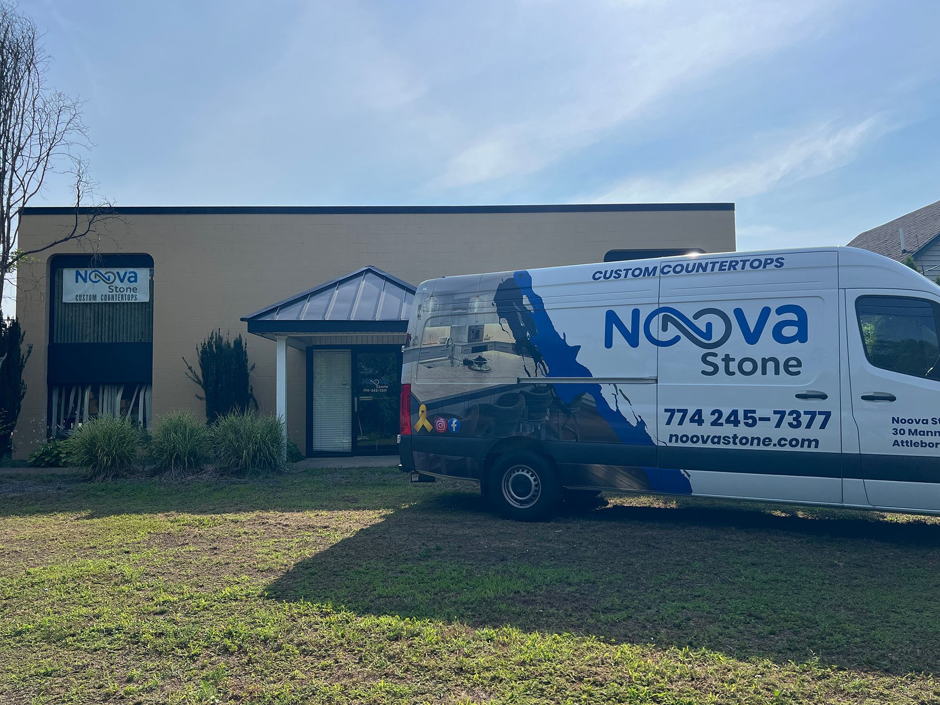 Nova Stone service van parked outside a building on a sunny day