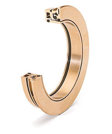 A close up of a metal ring on a white background