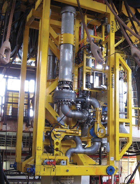 A large yellow structure with a few pipes on it
