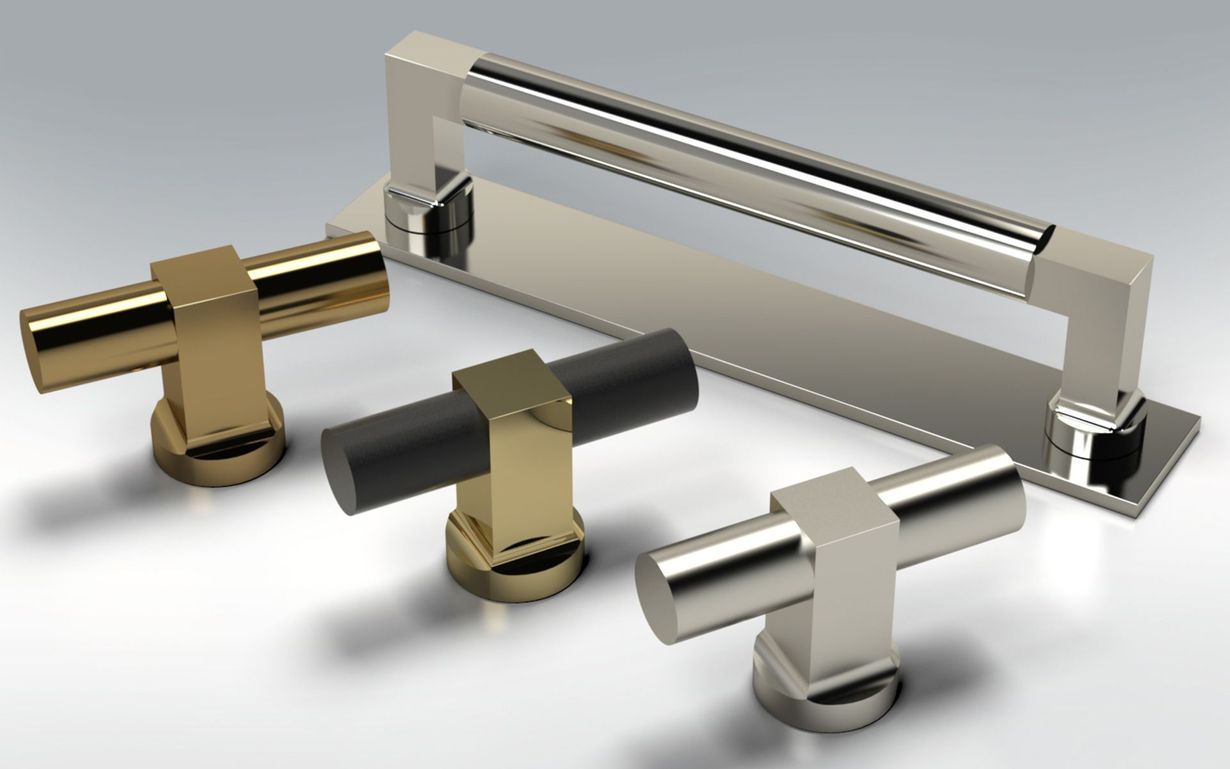 Three different types of metal handles are sitting next to each other